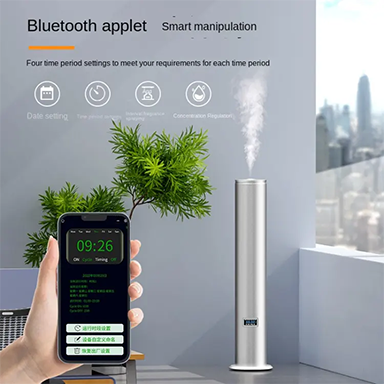 A tall, cylindrical diffuser with a digital display, emitting vapor, controlled by a smartphone app